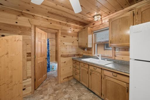Full bath in the distance, but you do have this additional kitchen space on the main level too. You could have multiple families or guests here!