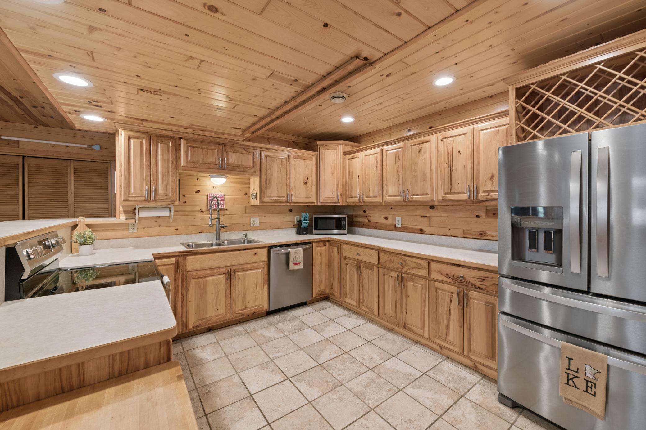 The kitchen is huge, and it blend the woodwork right in!