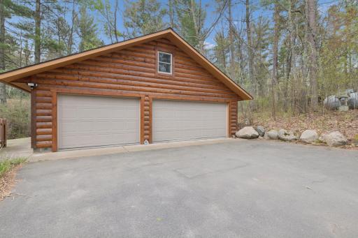 3-car garage closest to the house. the door on the right side IS a bit larger than the one on the left.