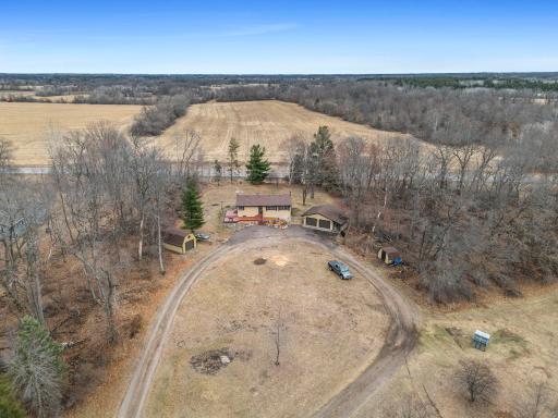 Enjoy the apple trees lining the driveway and bring the animals with to these 5 acres.