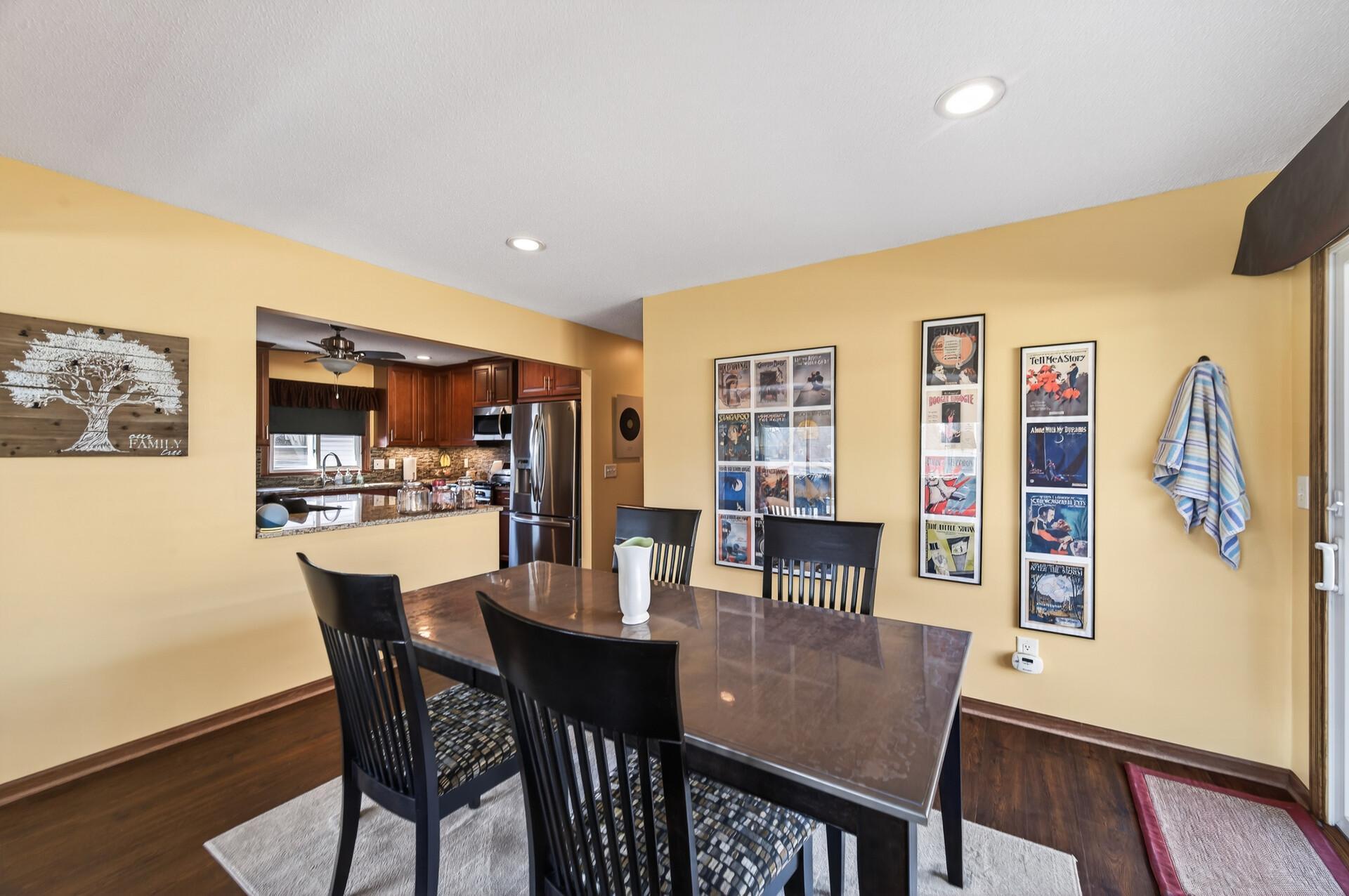 Well-positioned dining area near kitchen for convenience.