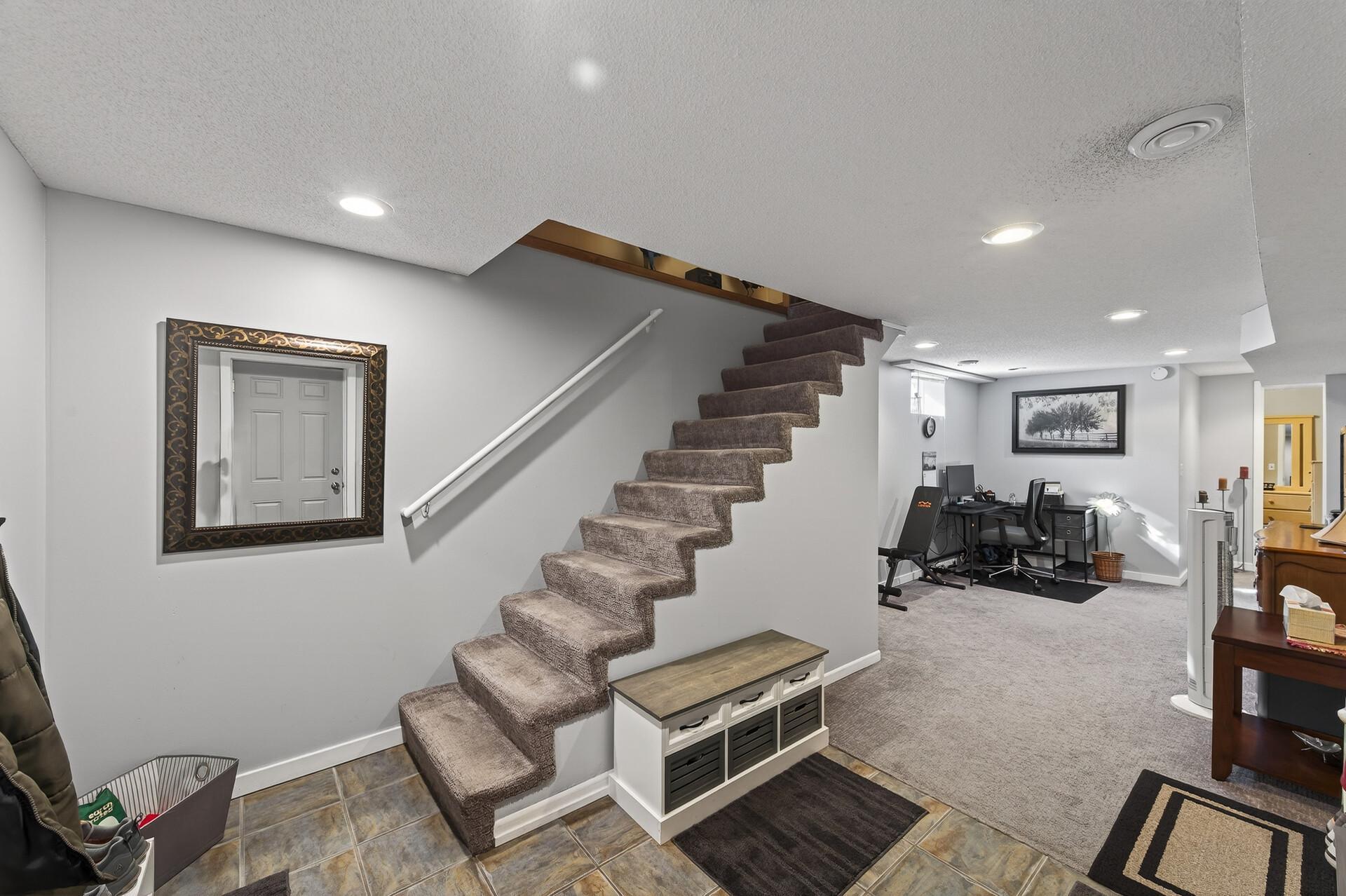 Open stairs to the lower level.