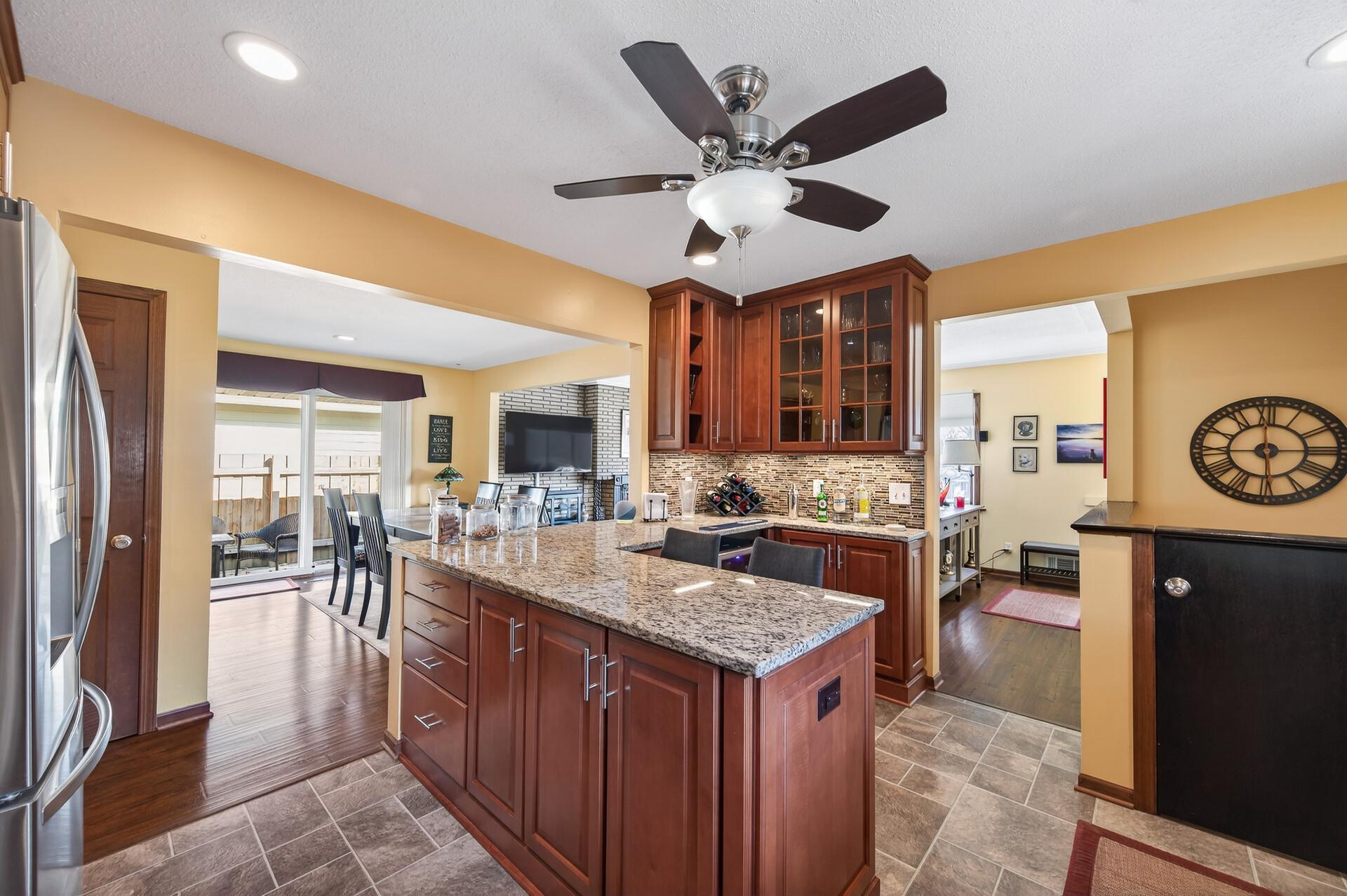 Kitchen is super convenient to the dining area.