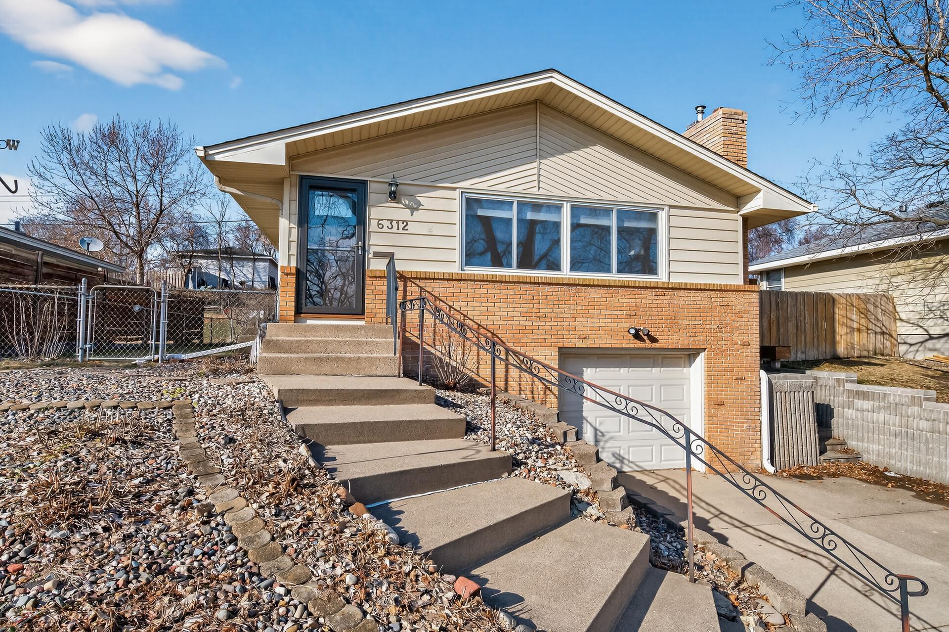 New front entrance door and Anderson storm door.