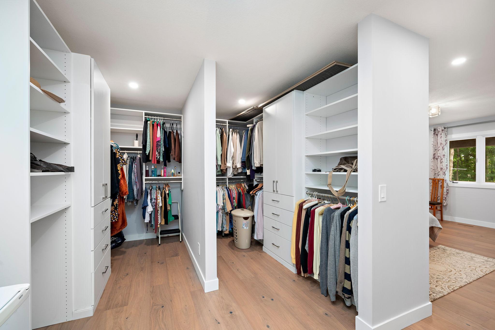 His/Hers walk-in closet off primary brm