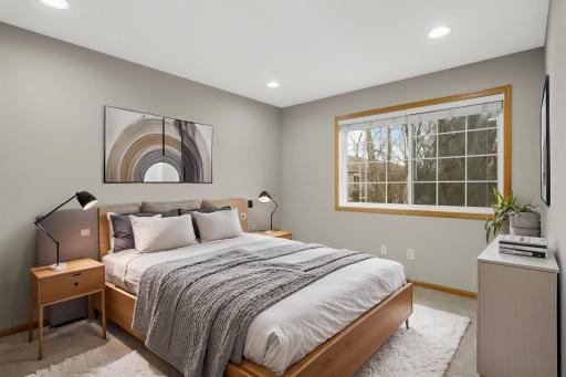 Bedroom 1 with pond views - virtually staged
