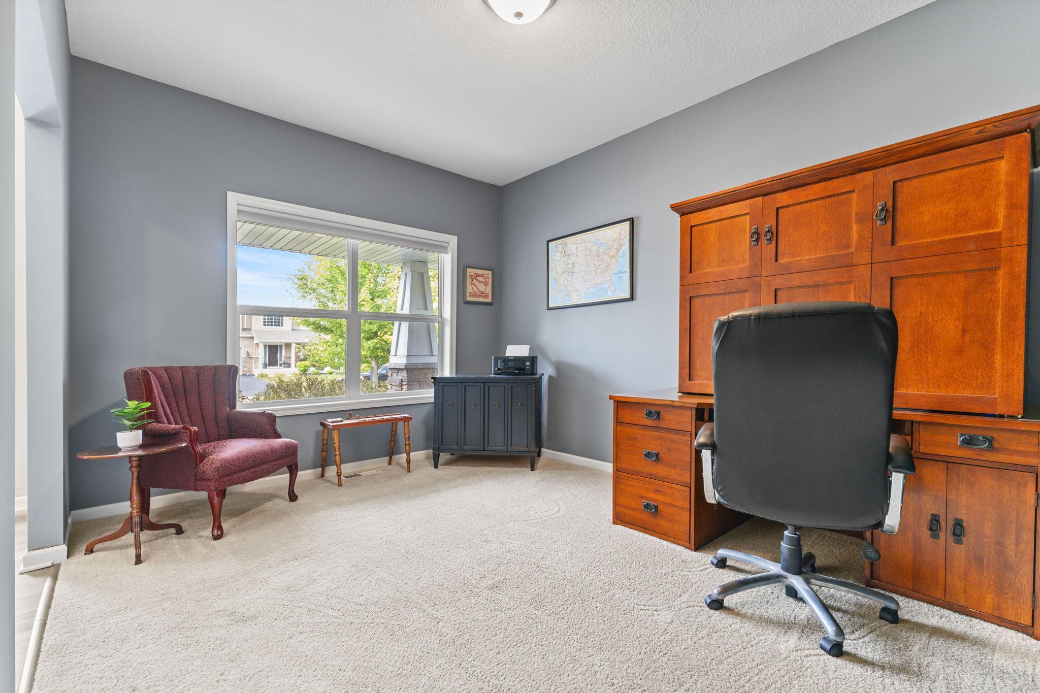 West-facing flex room off the foyer, filled with afternoon light-an ideal space for a home office, den, music room or playroom.