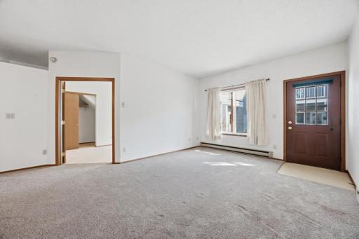 Living room and entrance to second bedroom
