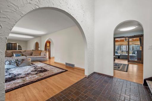 Main level front foyer/living room/kitchen and 4-season