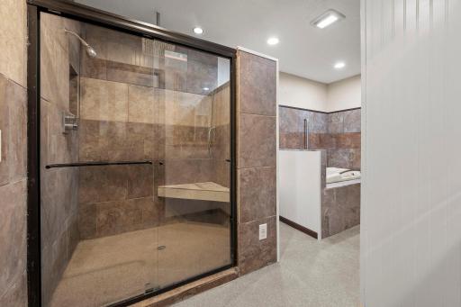 Upper level full bath with separate shower and jetted tub