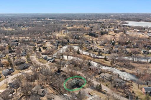 Just steps from Green Tree Island! Enjoy scenic trails, charming bridges, and peaceful water views right in the neighborhood.