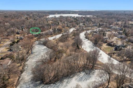 Just steps from Green Tree Island! Enjoy scenic trails, charming bridges, and peaceful water views right in the neighborhood.