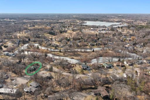 Just steps from Green Tree Island! Enjoy scenic trails, charming bridges, and peaceful water views right in the neighborhood.