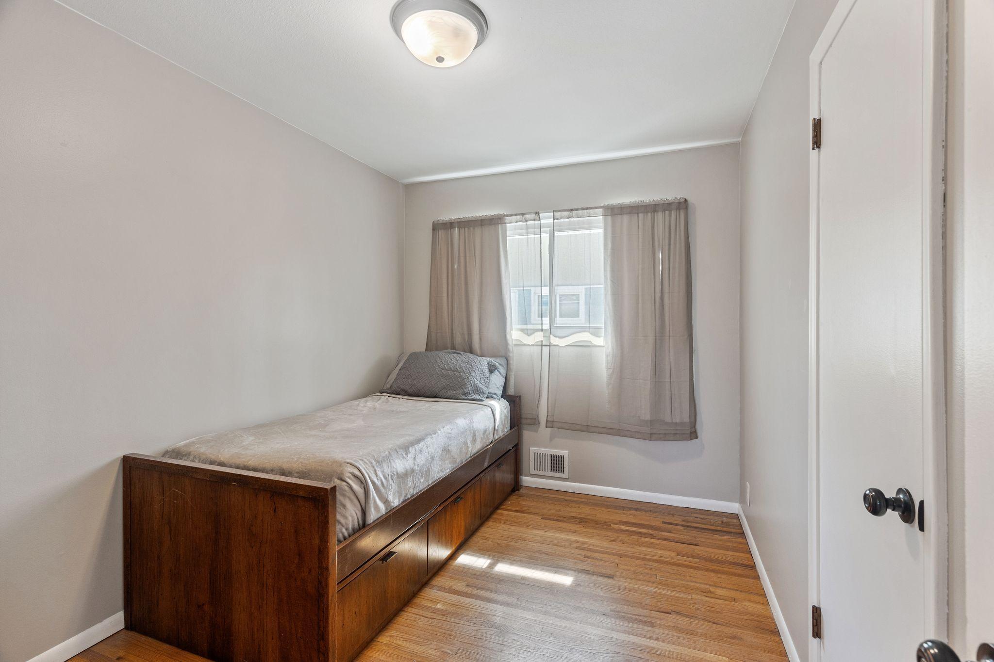 Bed 3 on main level, beautiful hardwood floors