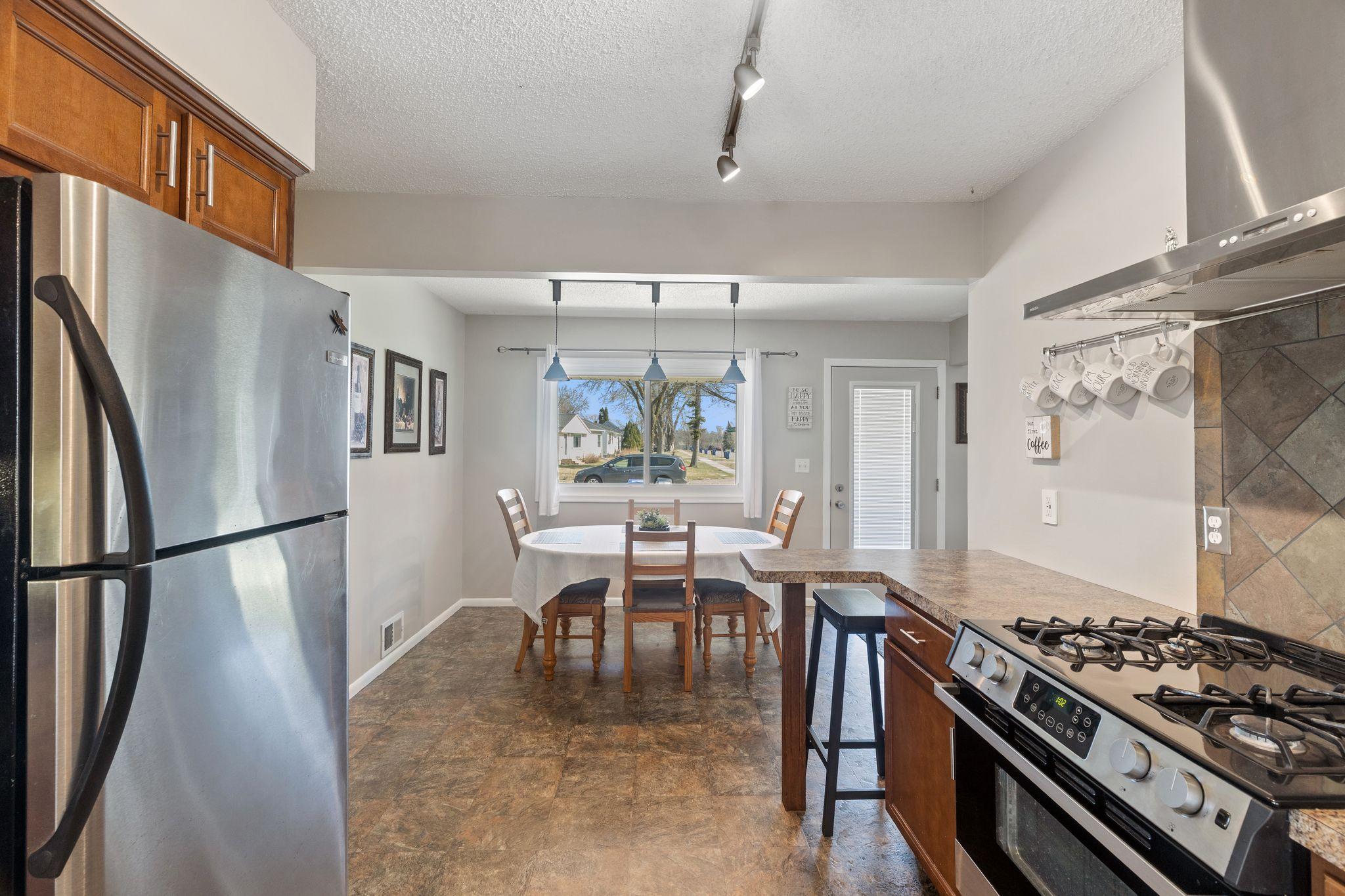kitchen open to informal dining room