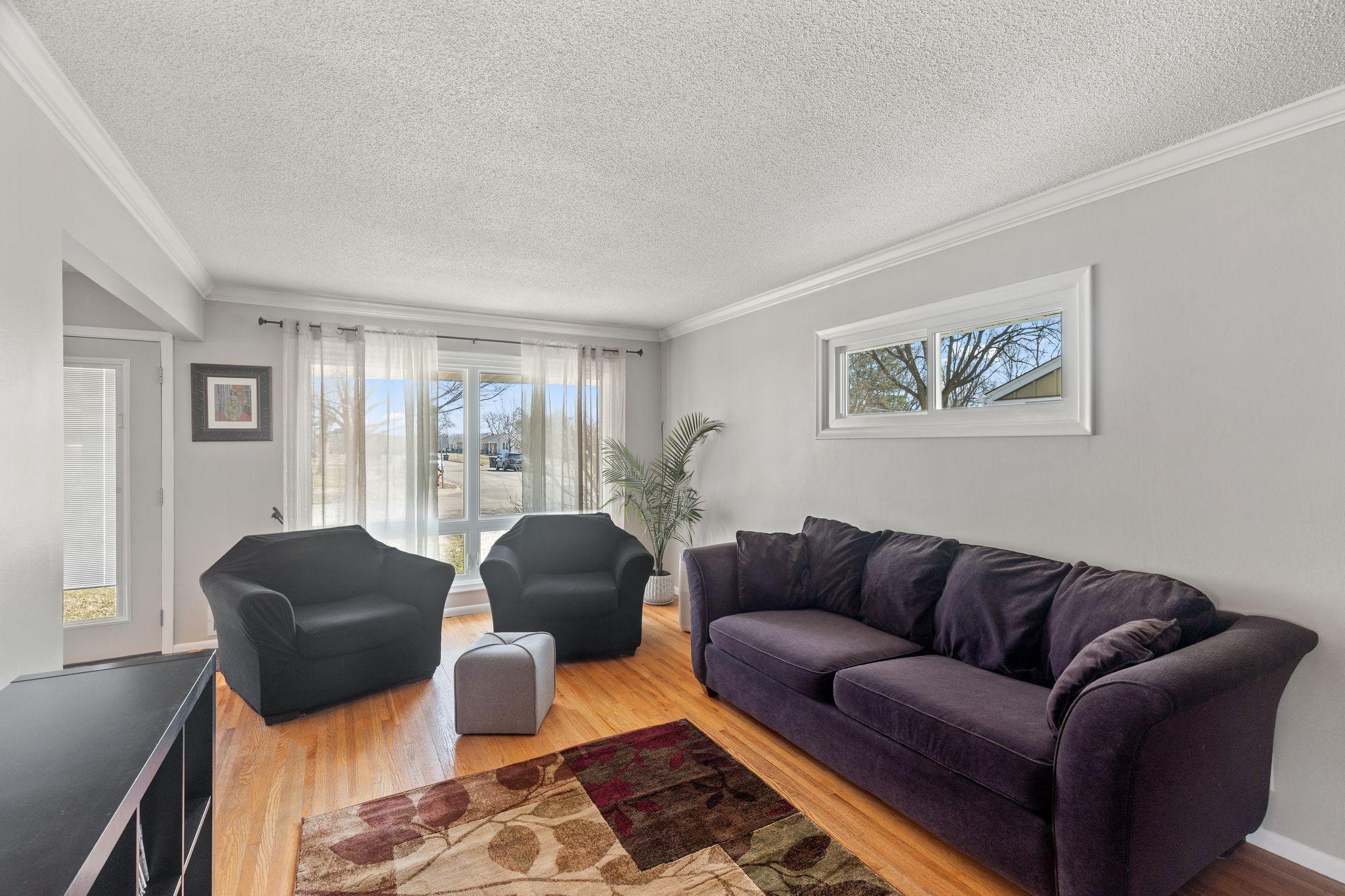 Newer windows with lots of natural light in the large living room