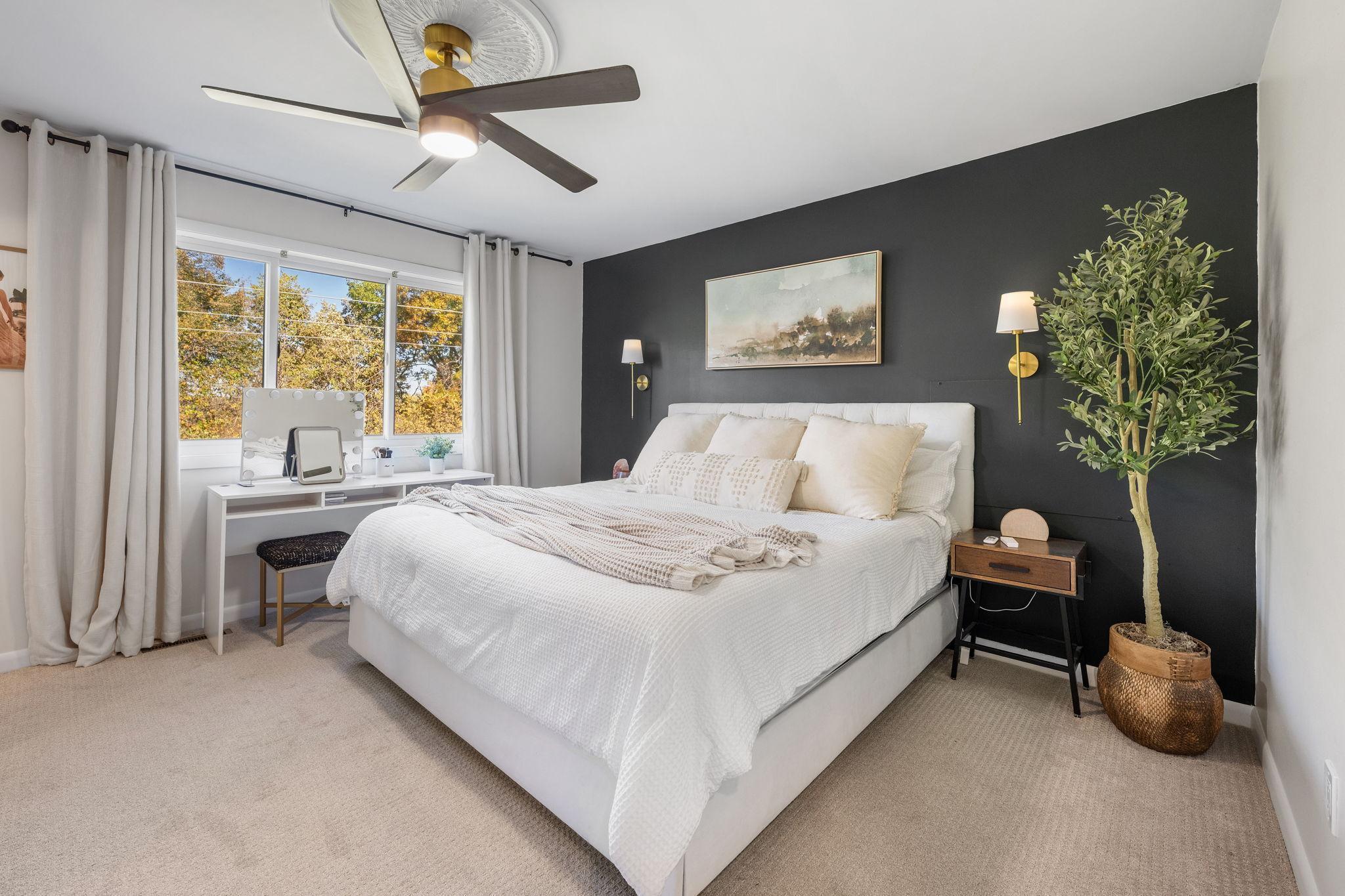 Welcome to this primary suite with back yard views and luxury bathroom.