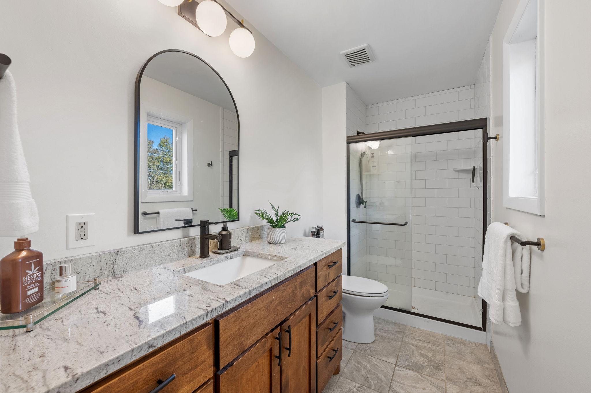 Master suite with quartz c-tops, ceramic shower.