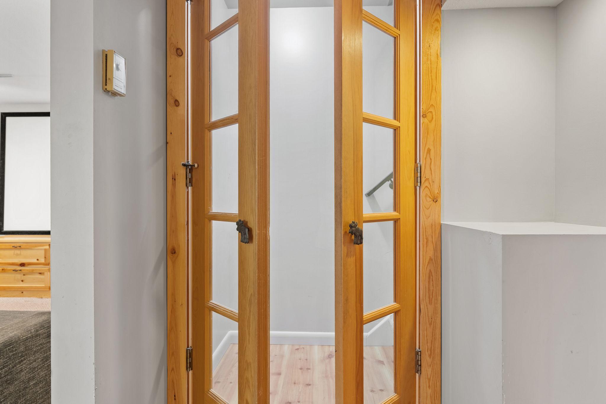 Close off the lower level to make for a private suite/multi-generational living.