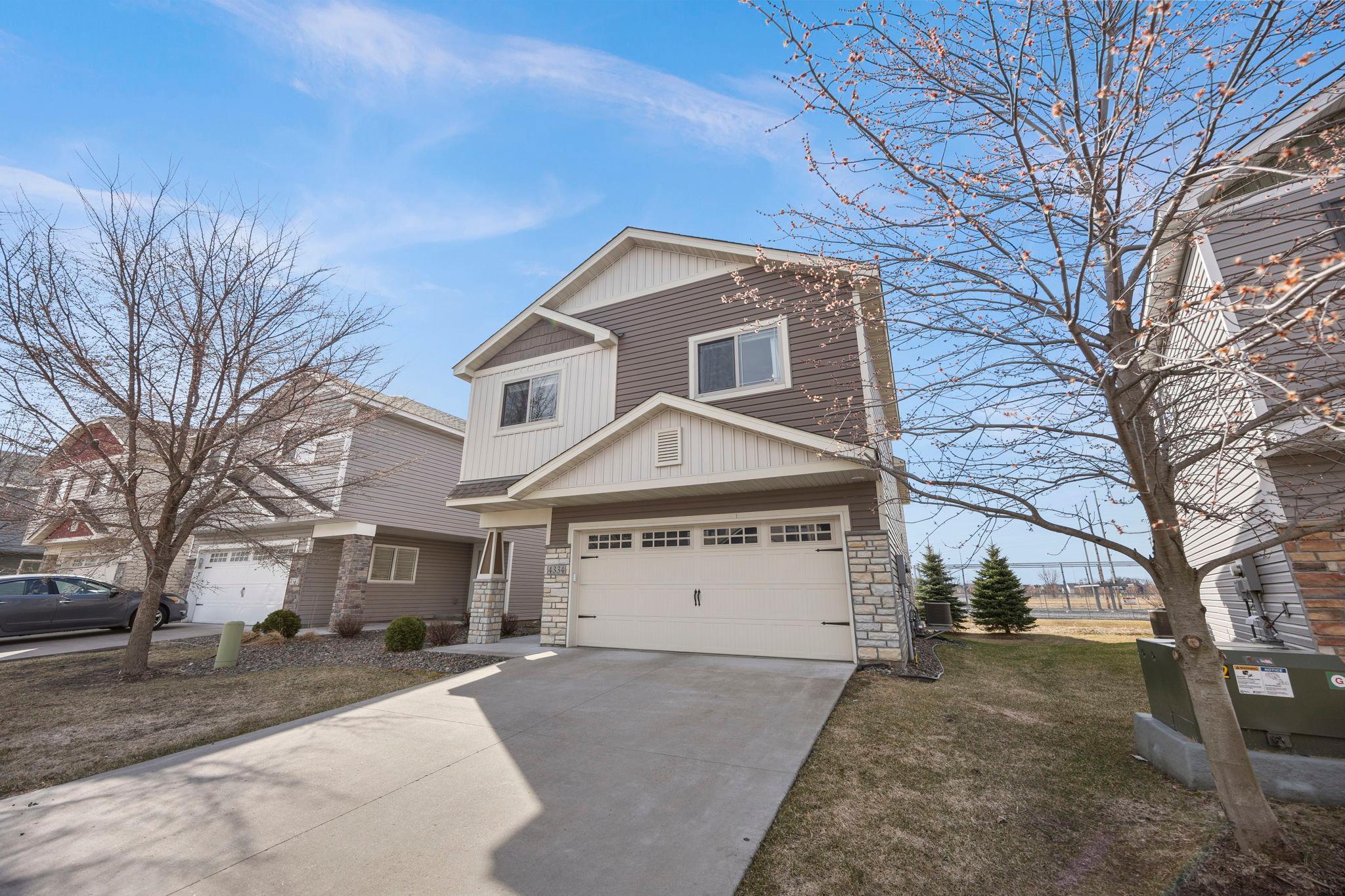 The home is set in a quiet, well-maintained neighborhood with close proximity to parks, trails, shopping, and dining