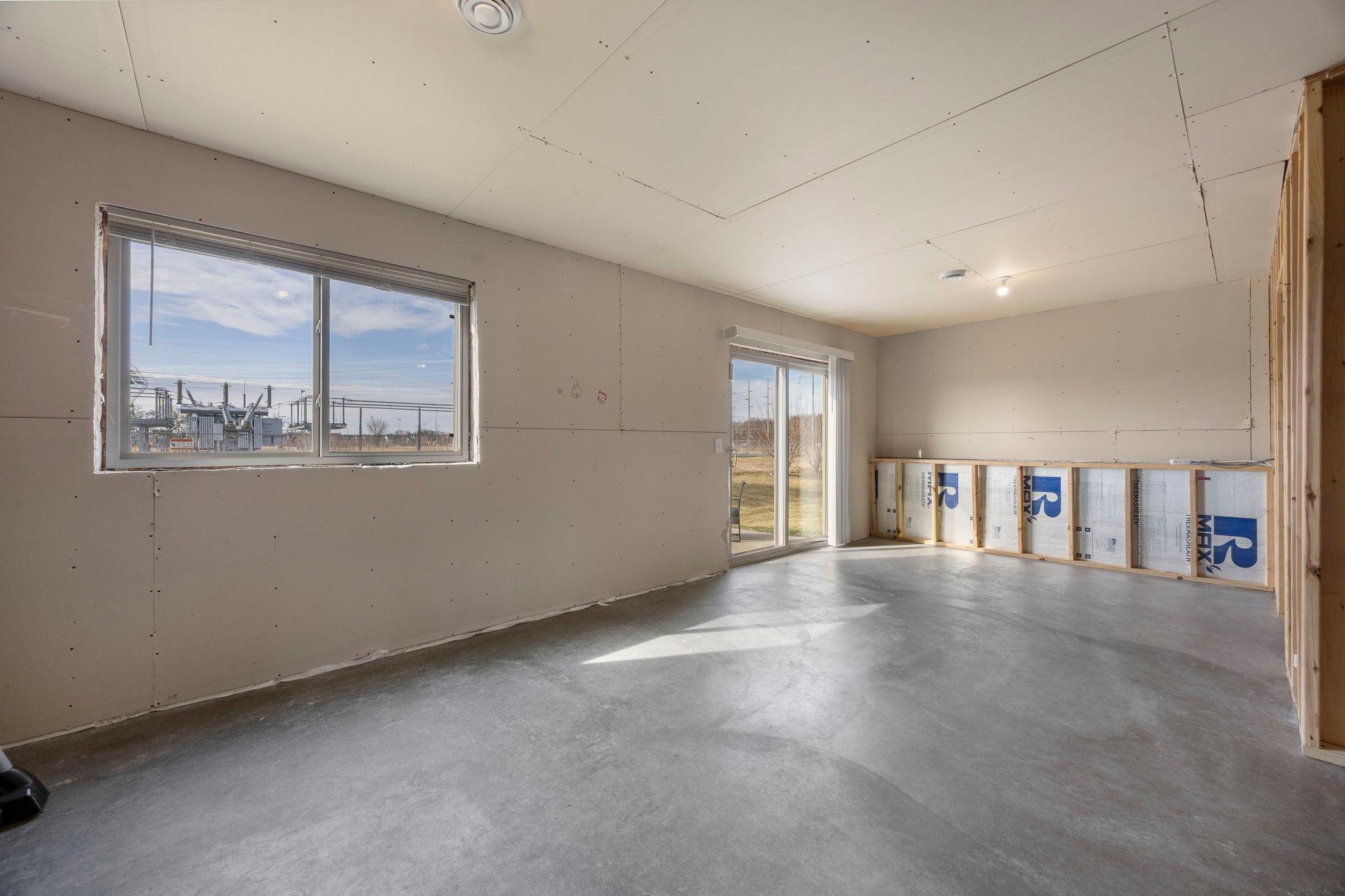 Walkout lower level offers easy access to the patio