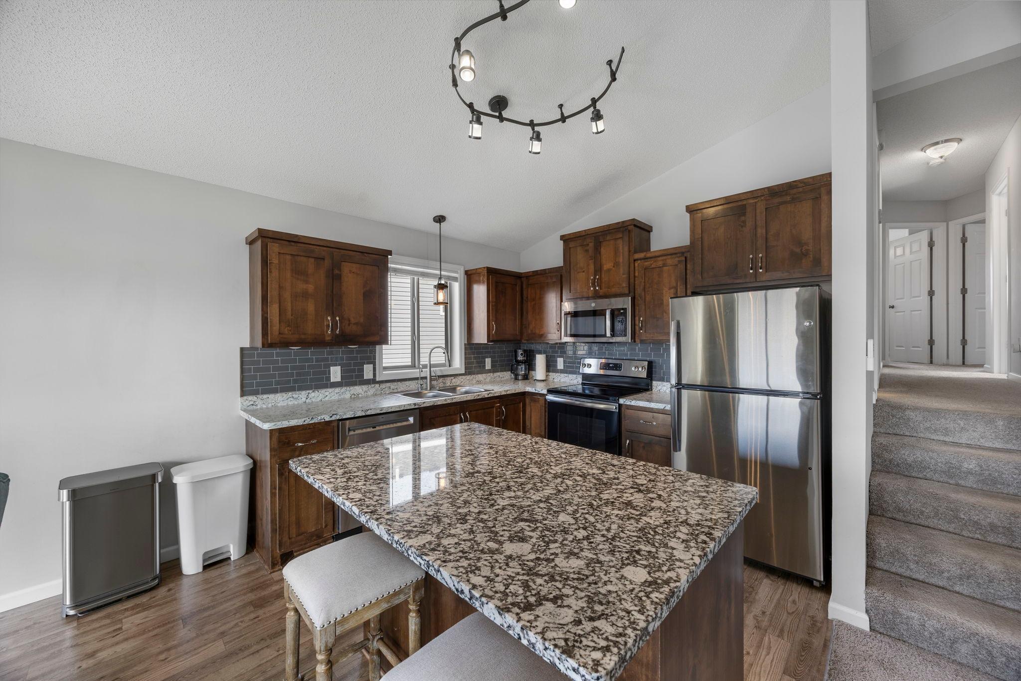 Stone countertop adorns the center island