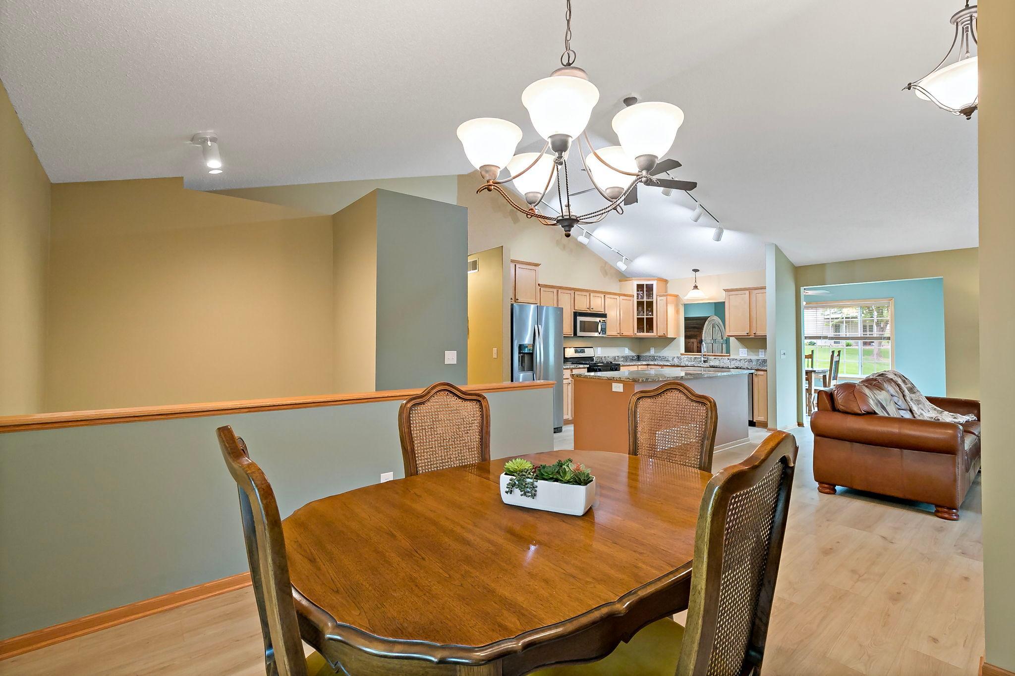 Another view of the dining area showcasing the open flow to all of the action