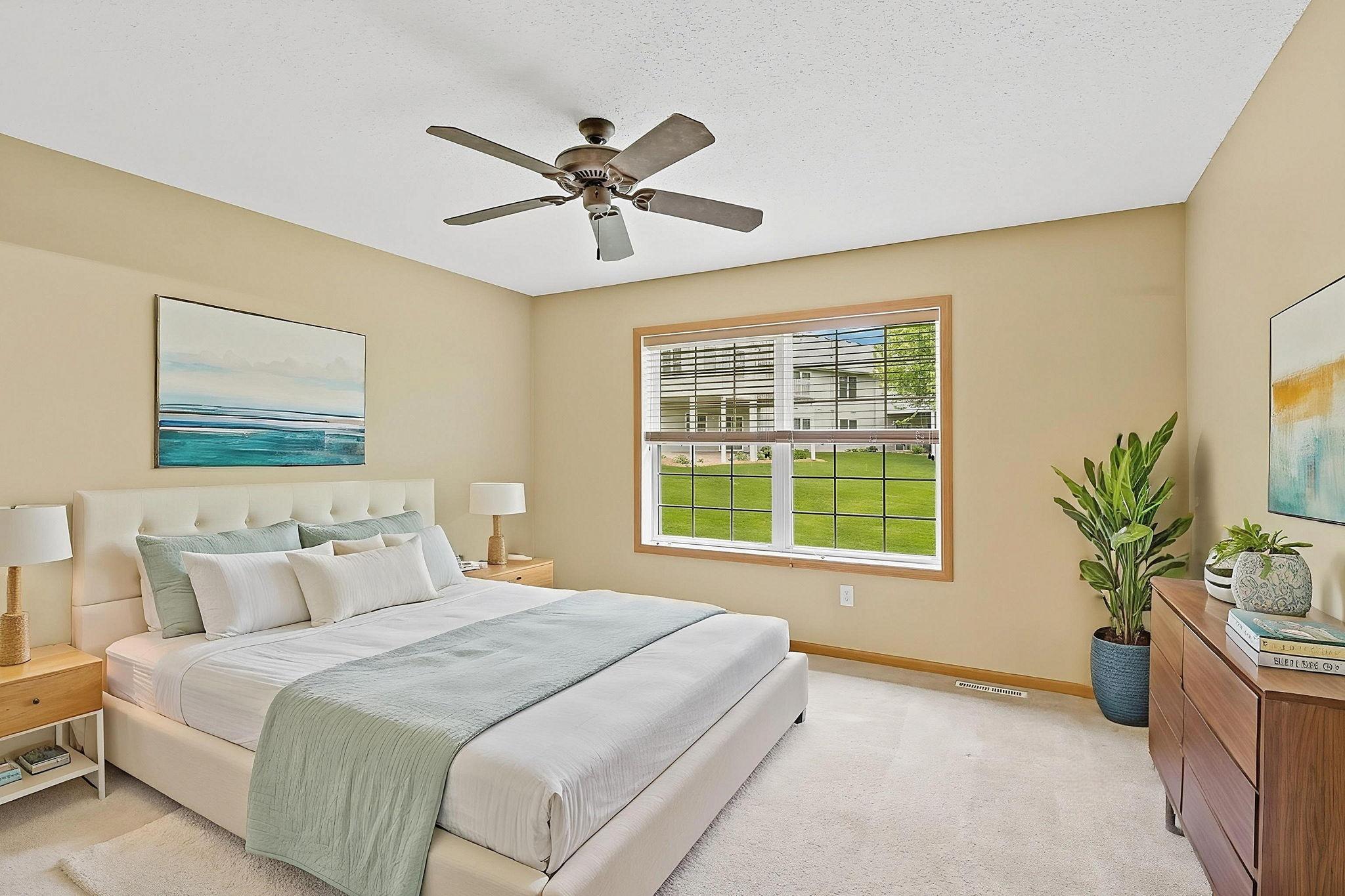 This dream oversized bedroom offers a peaceful escape with abundant space for large furniture, a cozy lounge area, and beautiful natural light that creates the perfect blend of comfort and elegance. Virtual staged