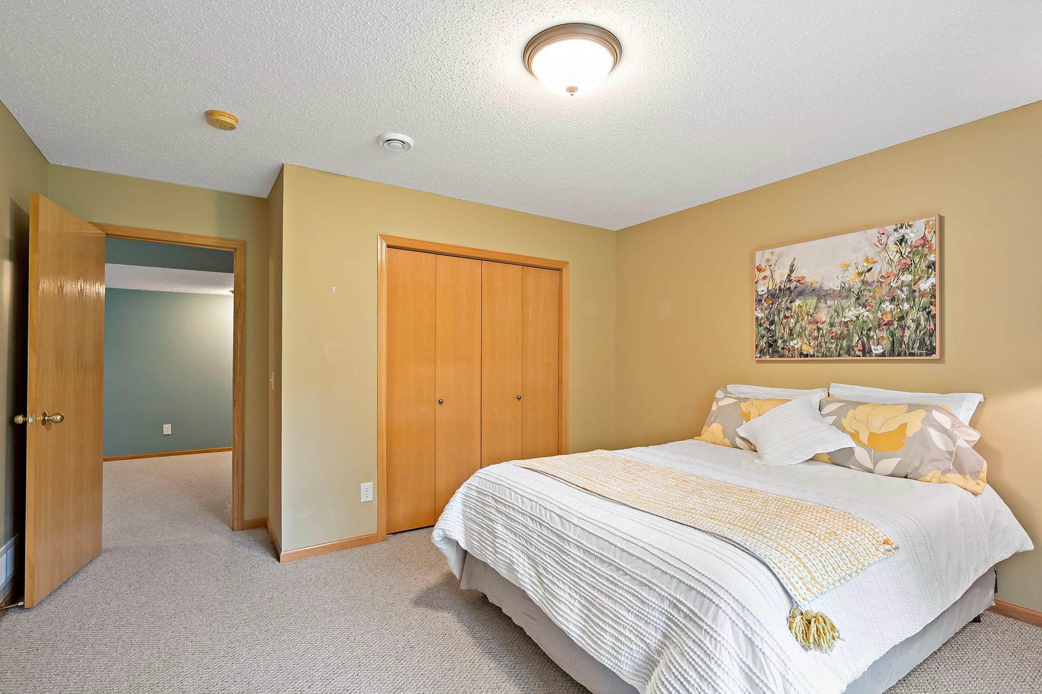 Exquisite 2nd oversized lower-level bedroom offering exceptional space, comfort, and flexibility