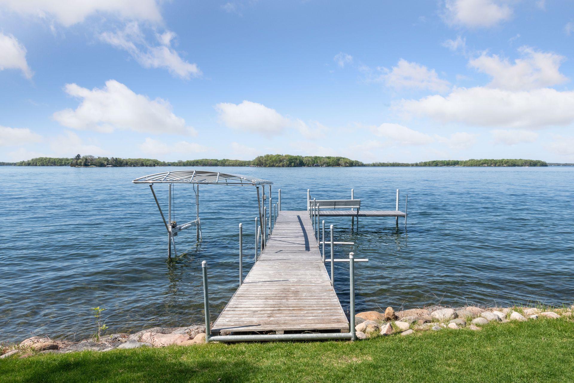 Please note the dock will stay however the boat lift, boat house and kayak lift will not convey.