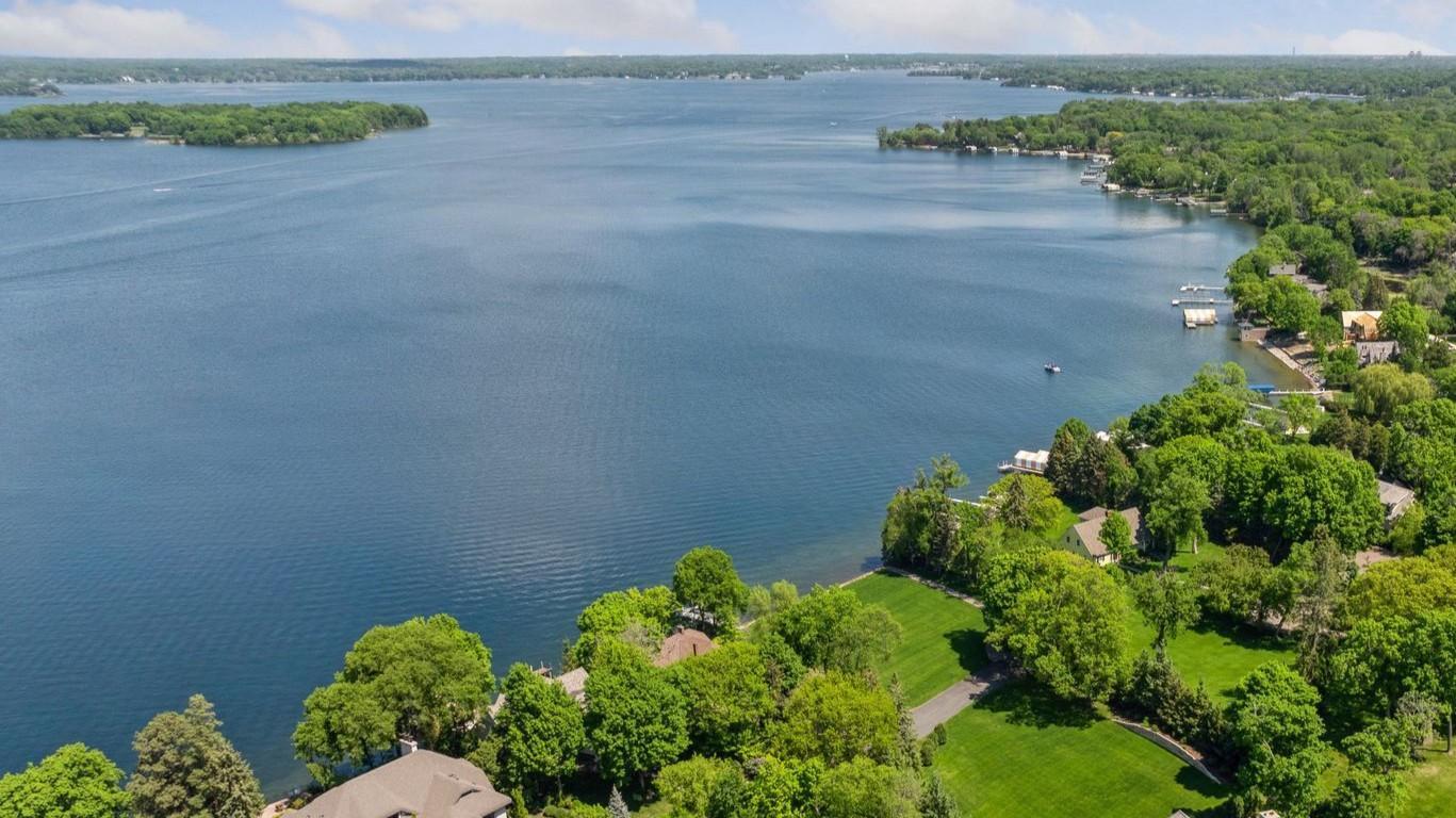 Greenwood—known as the City on the Lake—offers a rare opportunity to build along its coveted shoreline. This exceptional lakeshore homesite captures sweeping water views and the promise of a lifestyle centered around the lake.