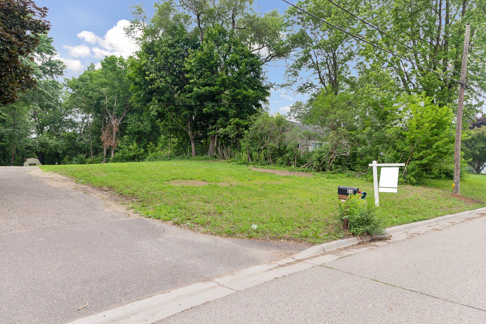 The property has approval for its own private driveway. Ask listing agent about innovative design for 3rd garage stall.