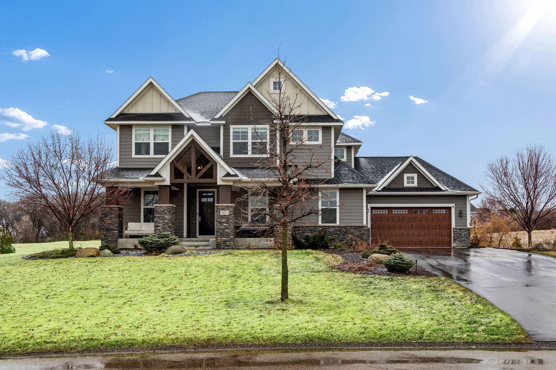 So many windows, bringing in natural light and connecting the home to its surroundings.