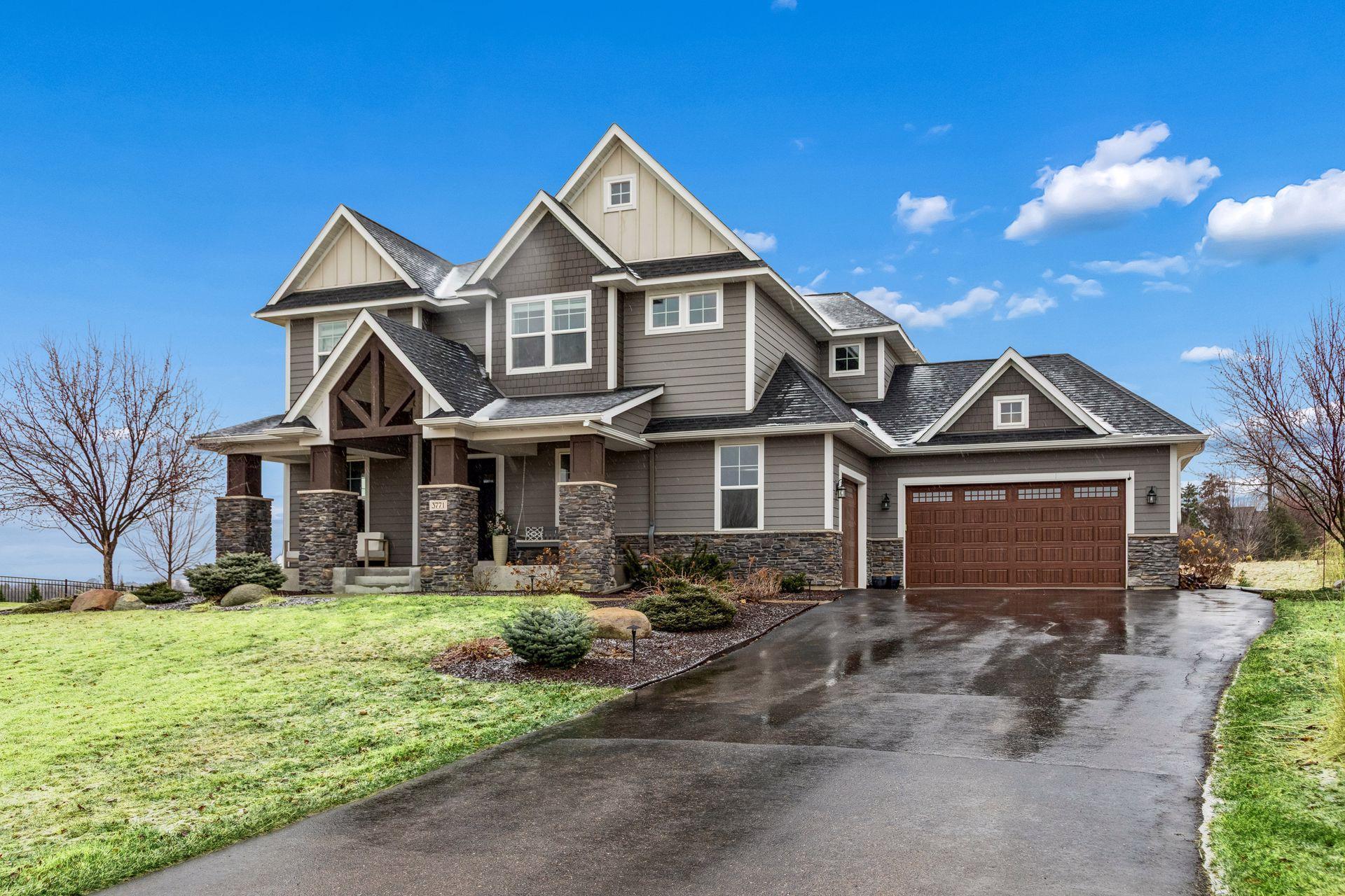 The long approach gives this home a grand, estate-like feel from the moment you arrive.