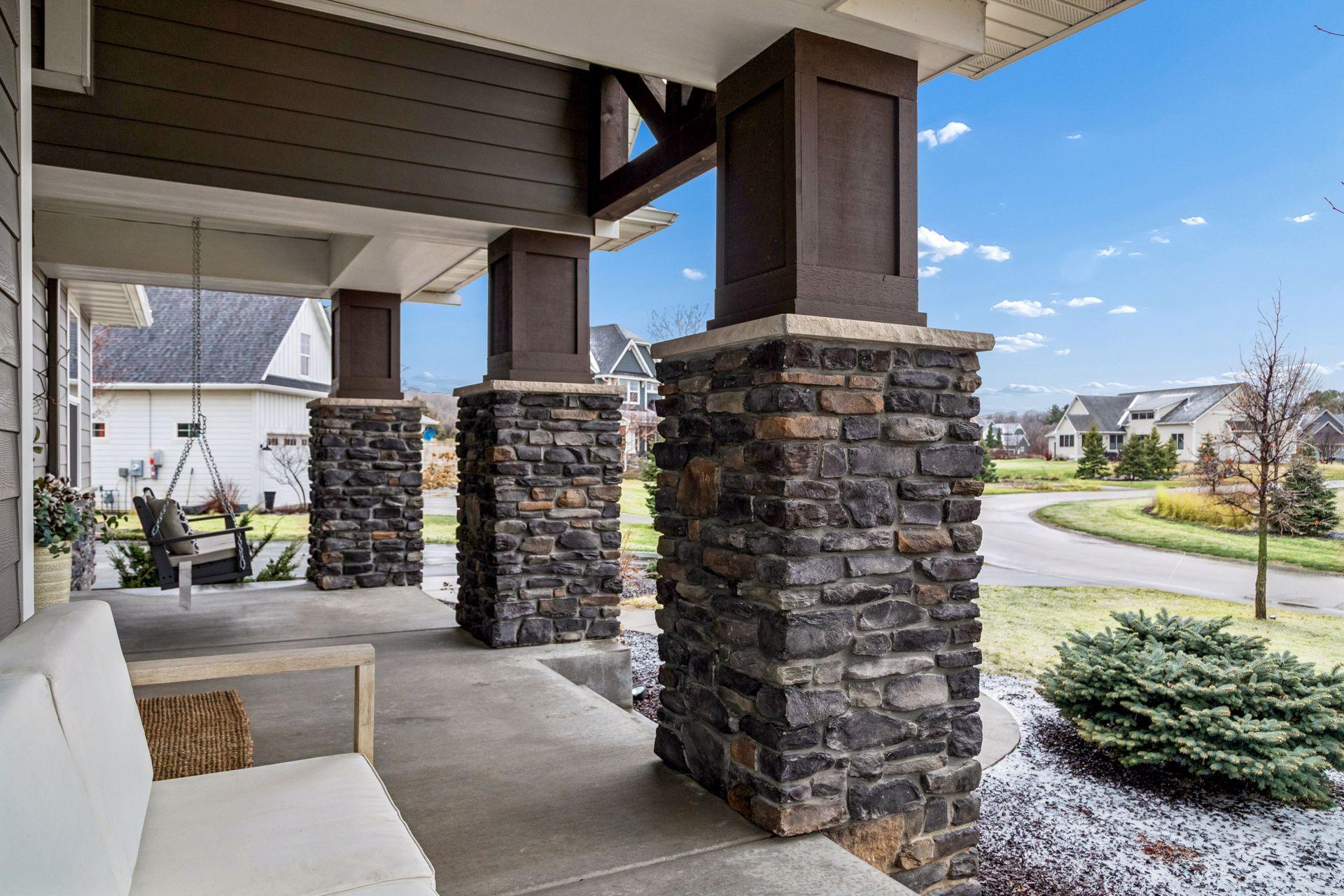 Beautiful woodwork and generous space make this porch feel like an extension of the home.