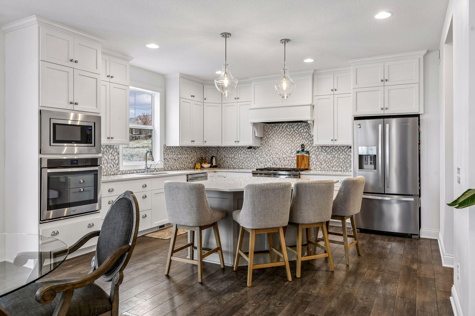 A stunning kitchen with warm, natural tones that feel both elevated and inviting.