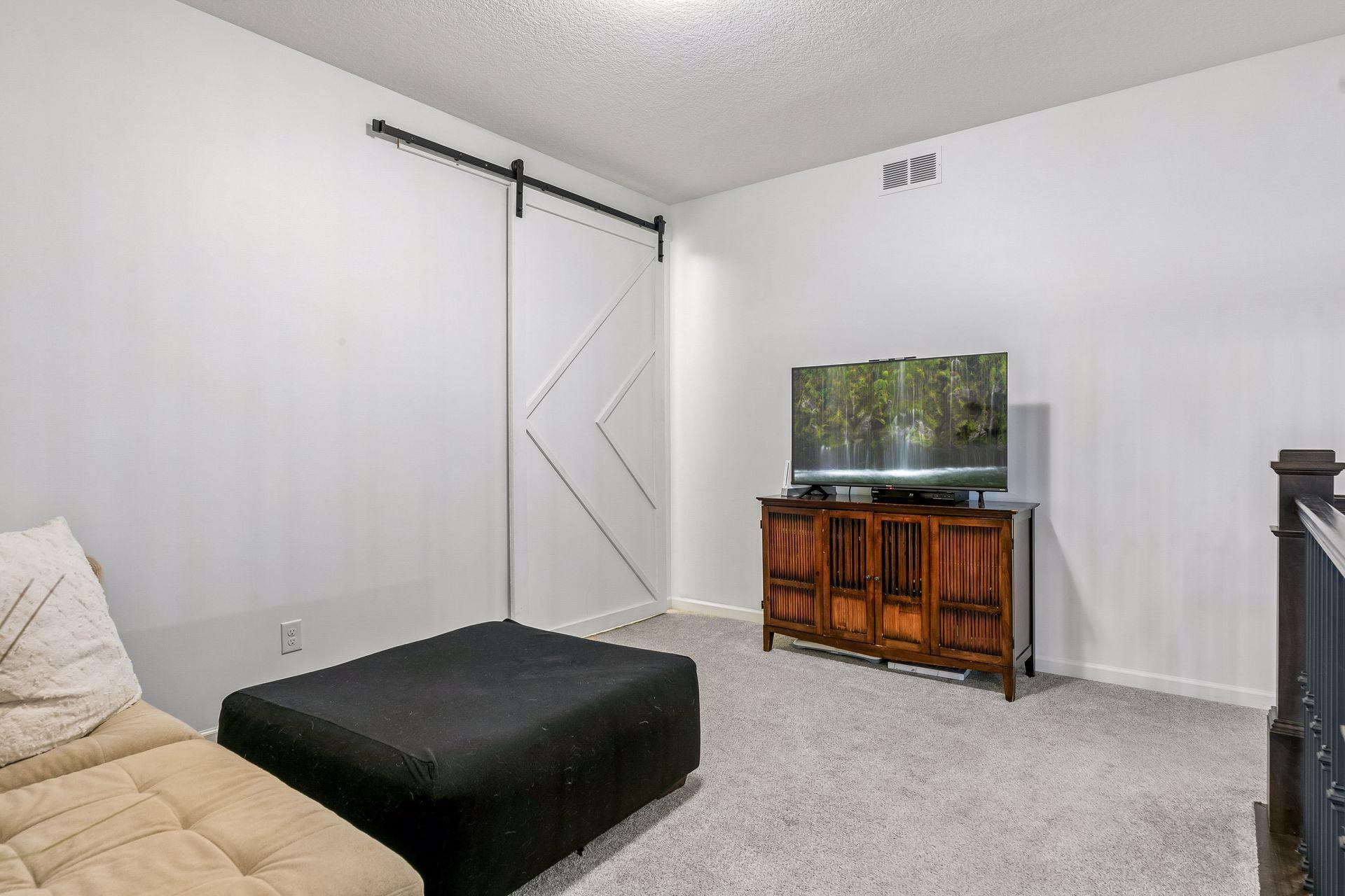 Welcome upstairs to a cozy loft—perfect for slow mornings or winding down at night.