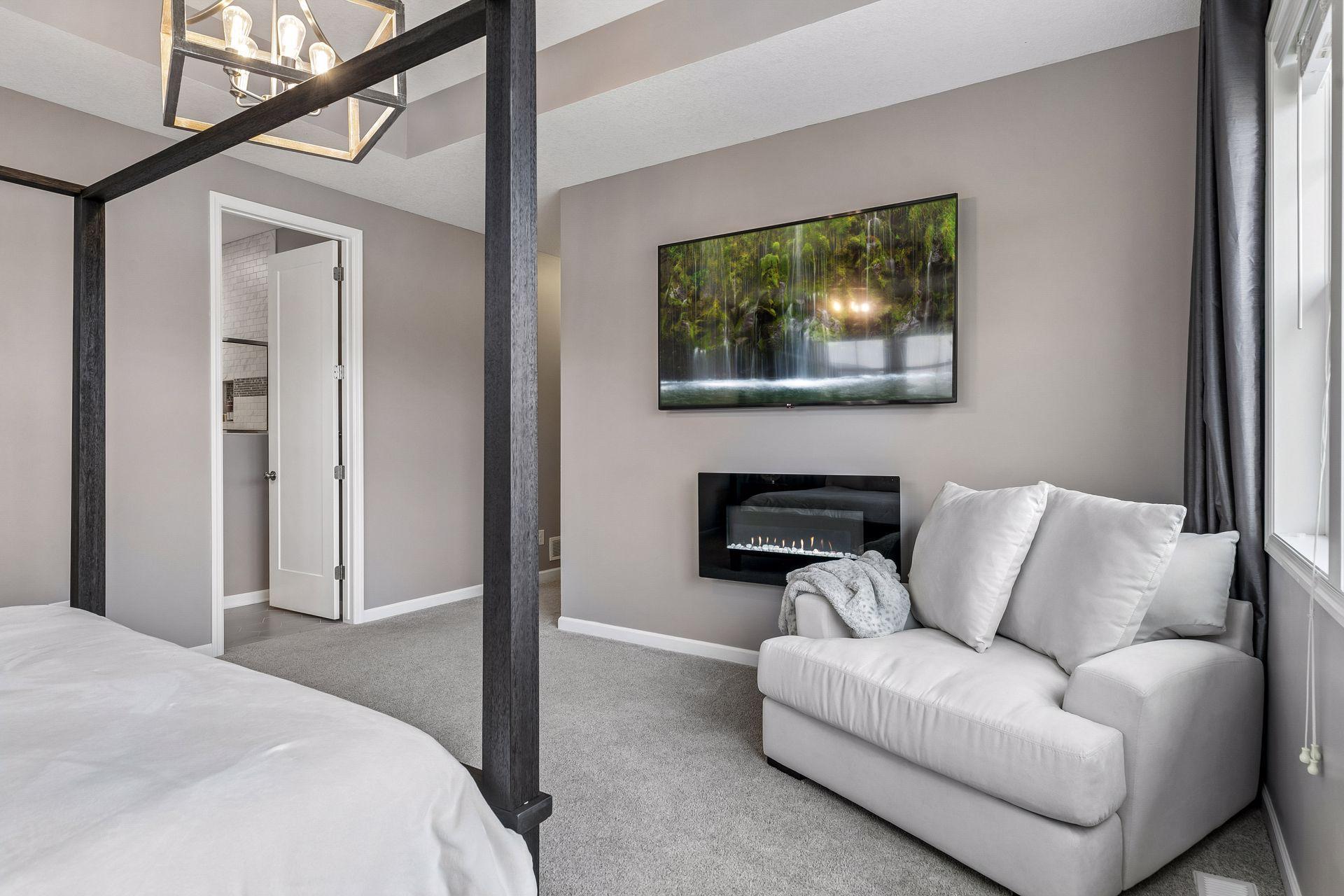 An electric fireplace adds the perfect touch of warmth and comfort to your private retreat.