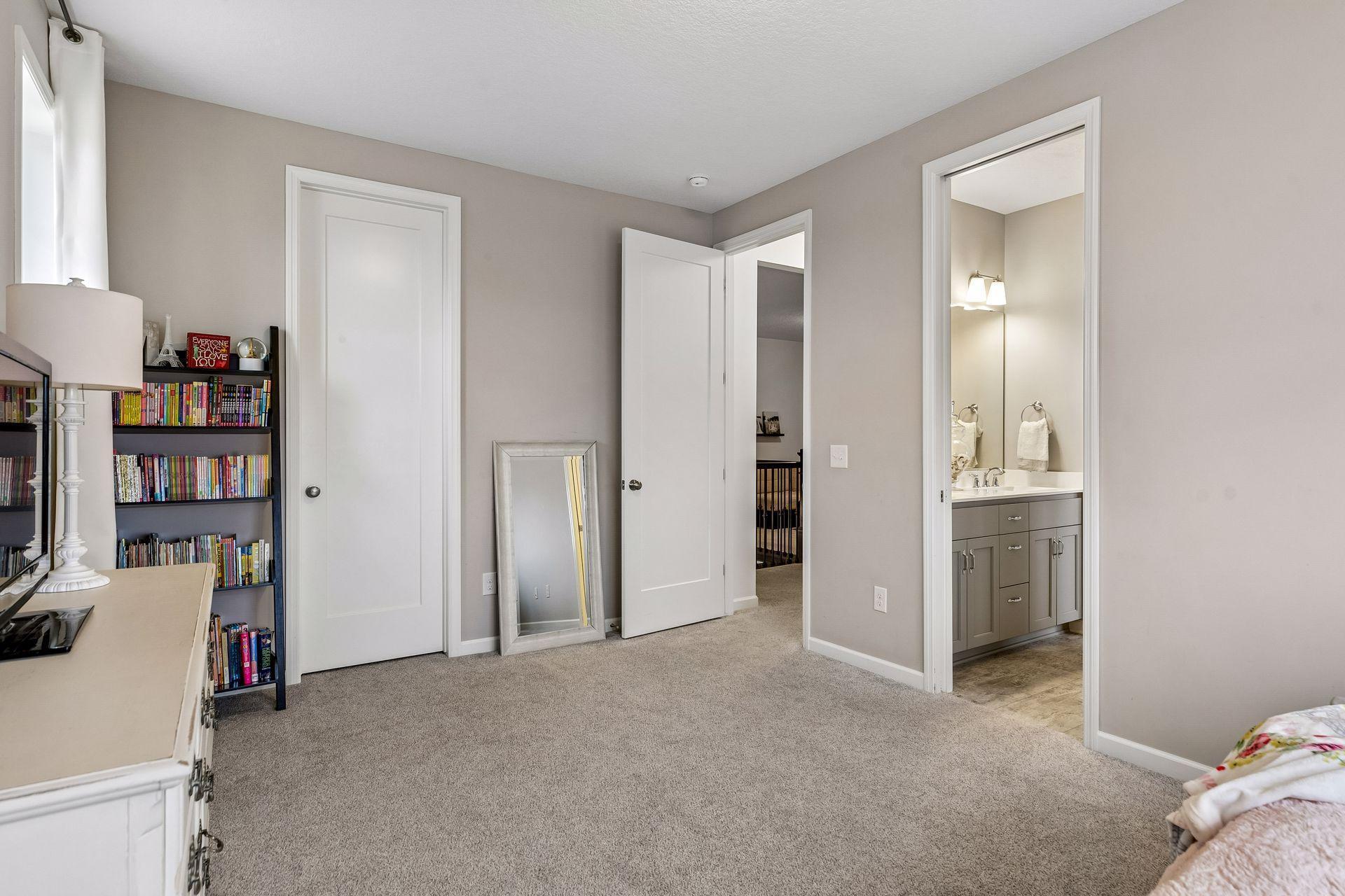 Another look at this connected bedroom—comfortable, functional, and thoughtfully laid out.