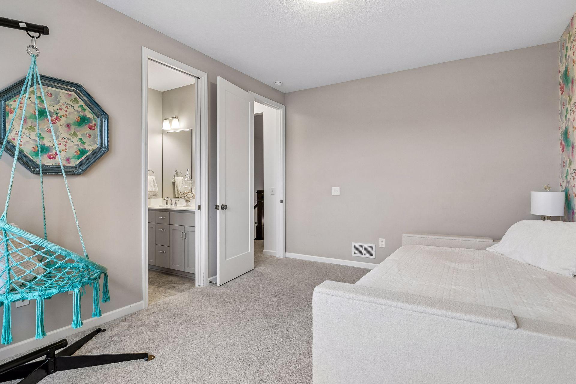 Another look at this inviting upper-level bedroom—comfortable, bright, and thoughtfully designed.