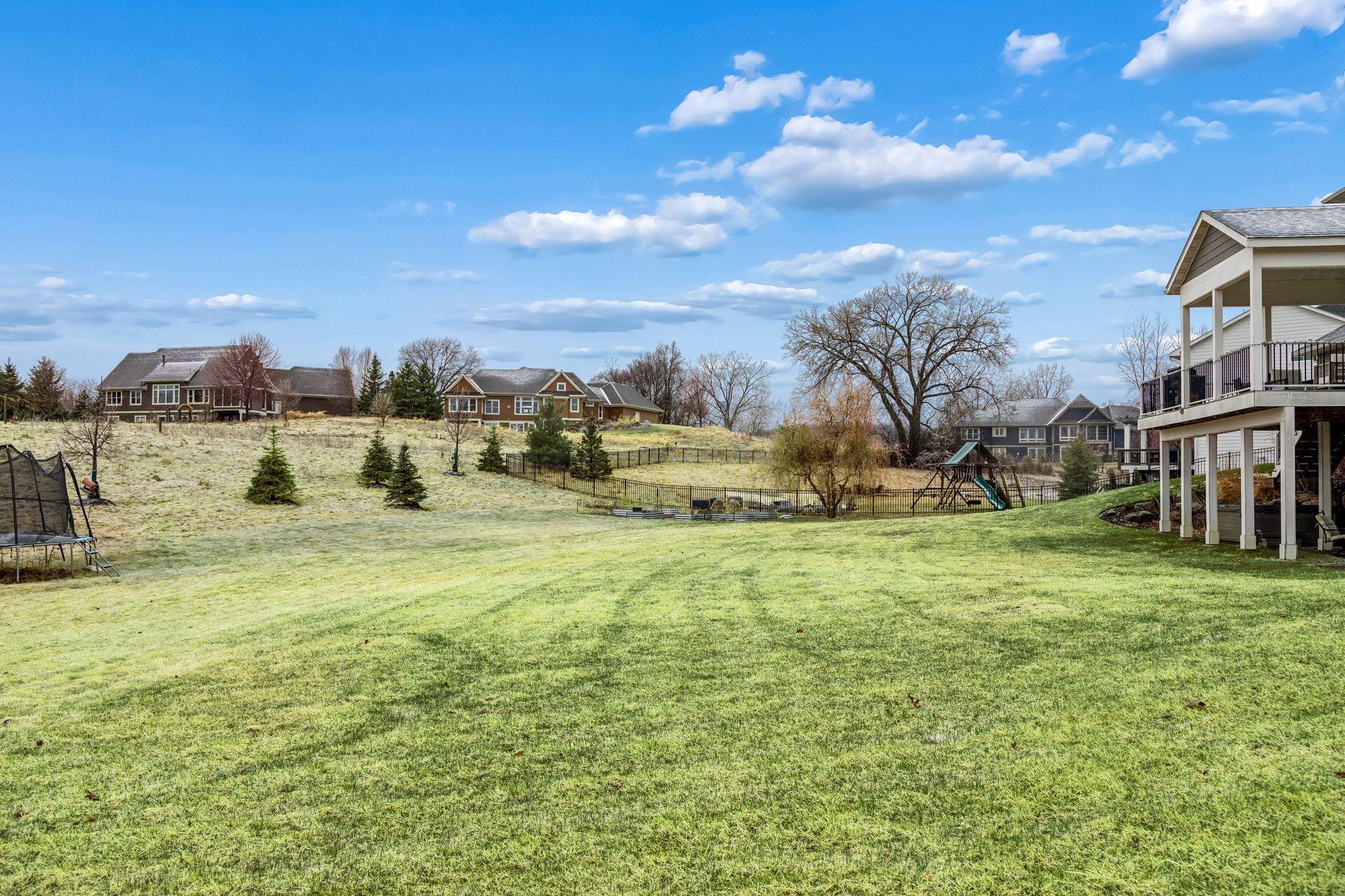 Your backyard flows seamlessly into 18 acres of HOA green space—offering privacy and room to roam.