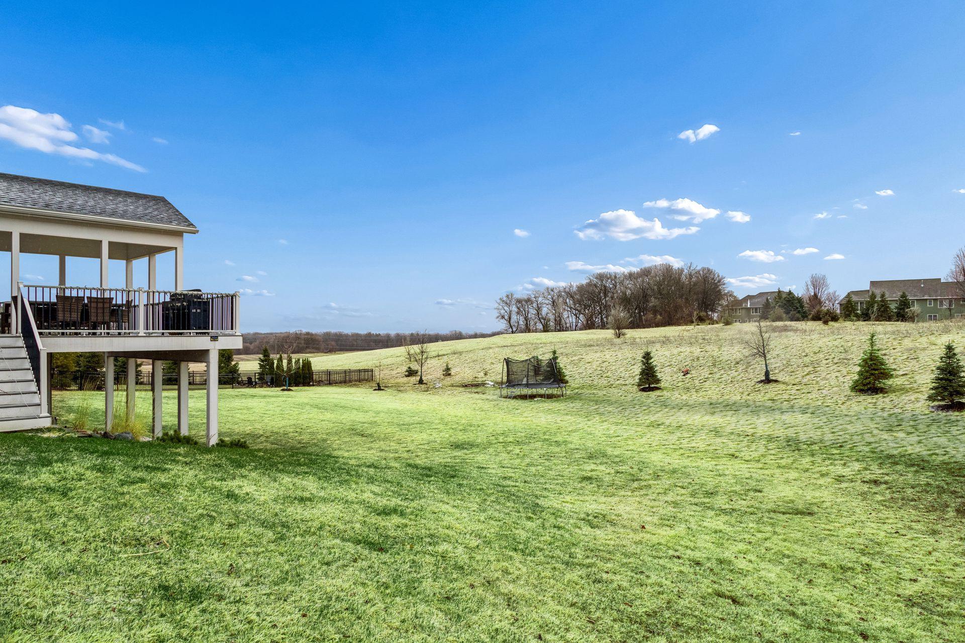 Wide open, full sun, and endless possibilities—this backyard is ready for whatever you envision.
