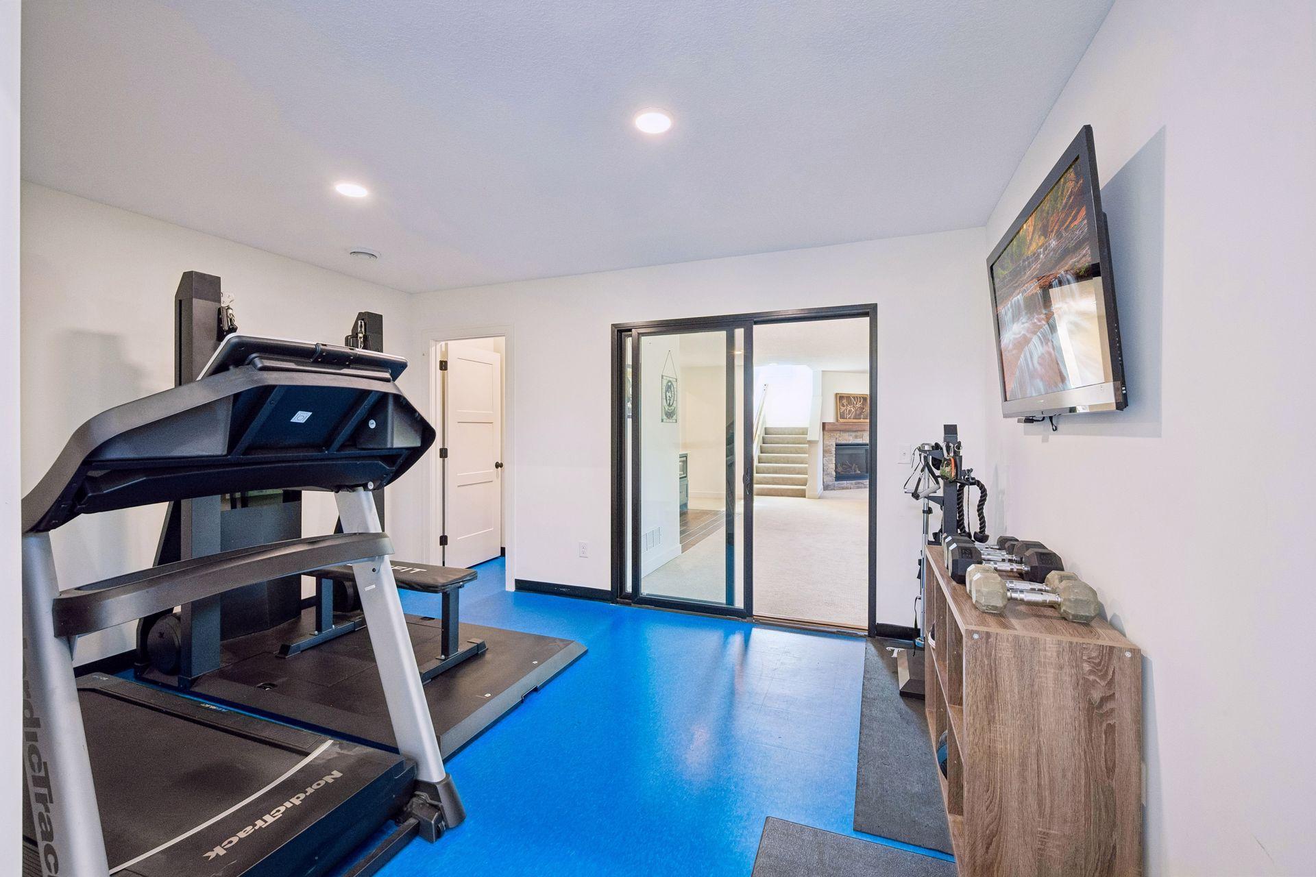 Lower level gym connects to the sports court.