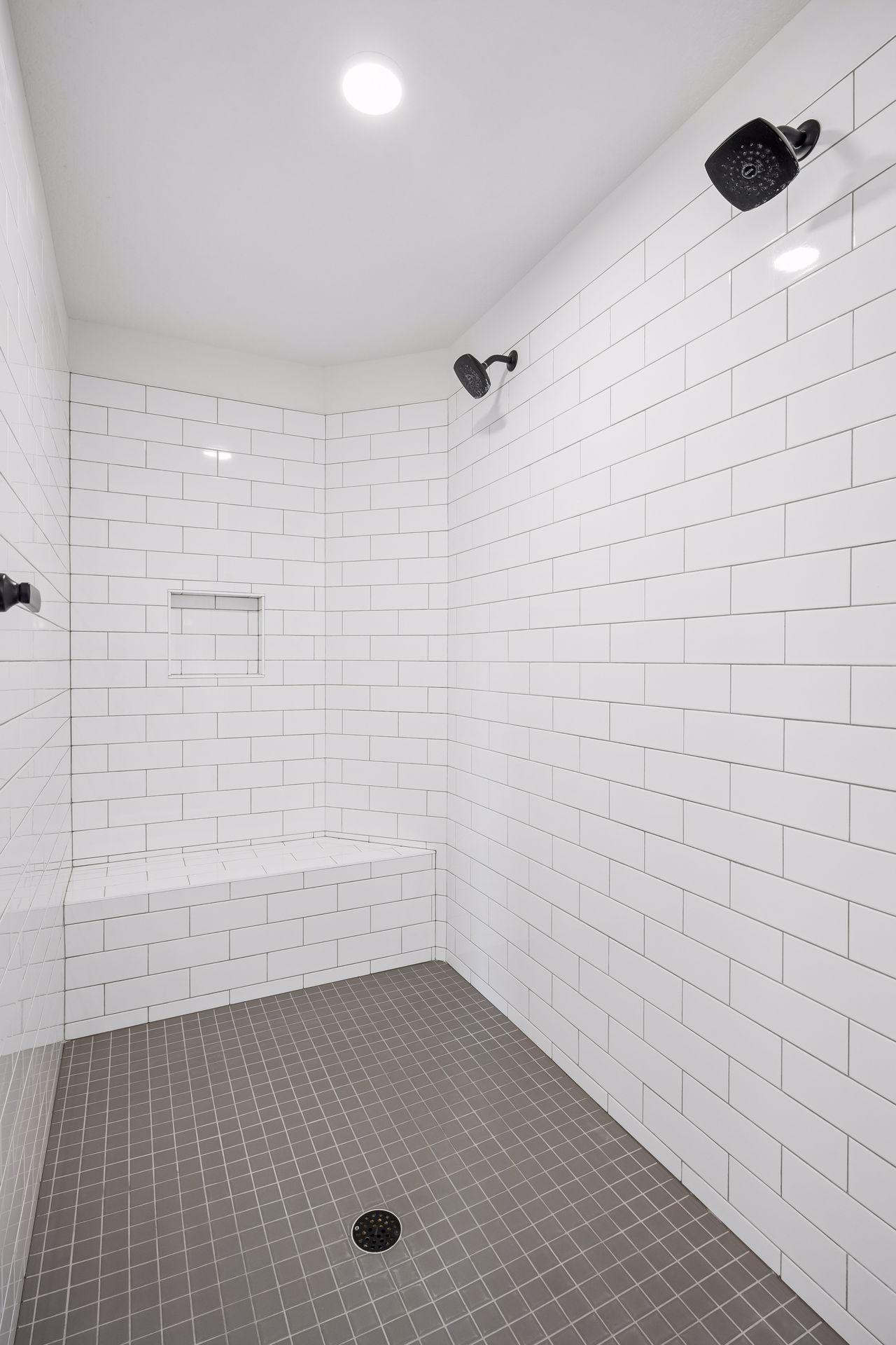 Primary bathroom walk-in tile shower.