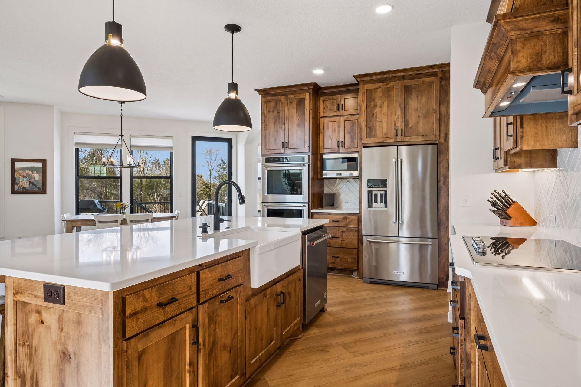Farmhouse sink, double ovens, and high end appliances.