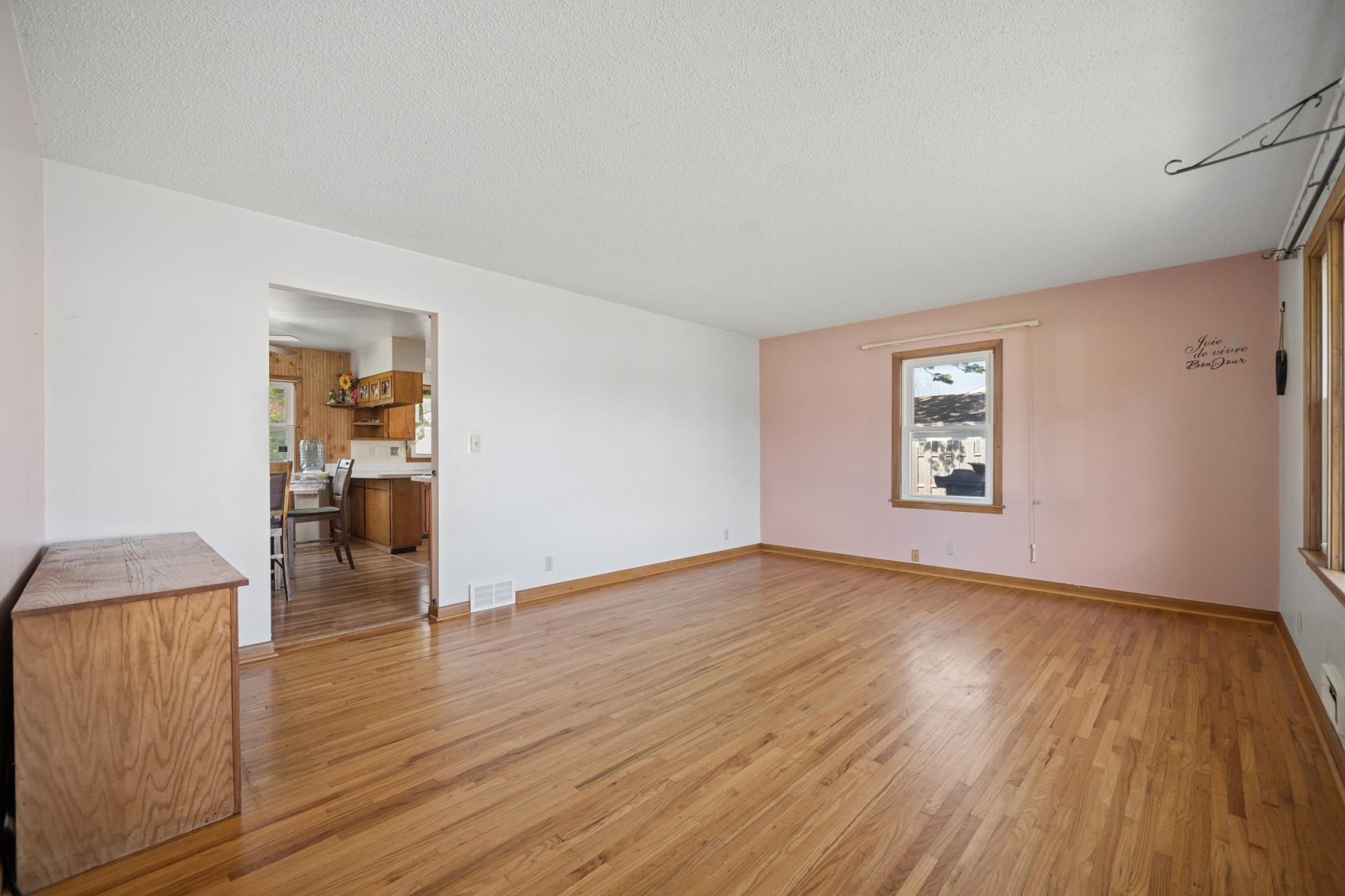 Living room with natural hardwood