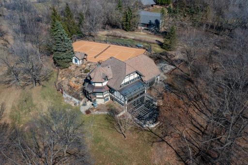 These original owners designed the home with beautiful roof lines, numerous copper and stone accents plus Andersen and Marvin windows.