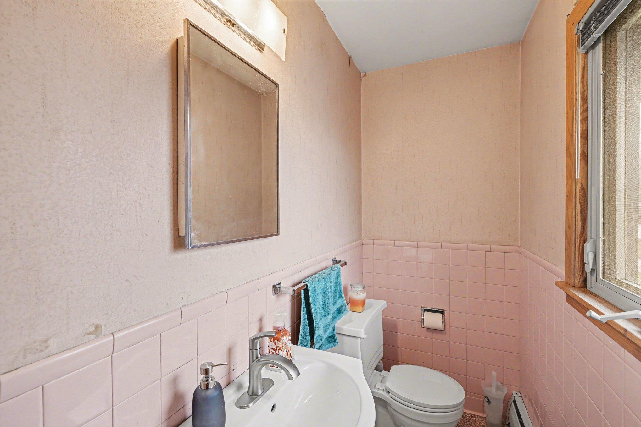 Convenient half bath off Owner's bedroom