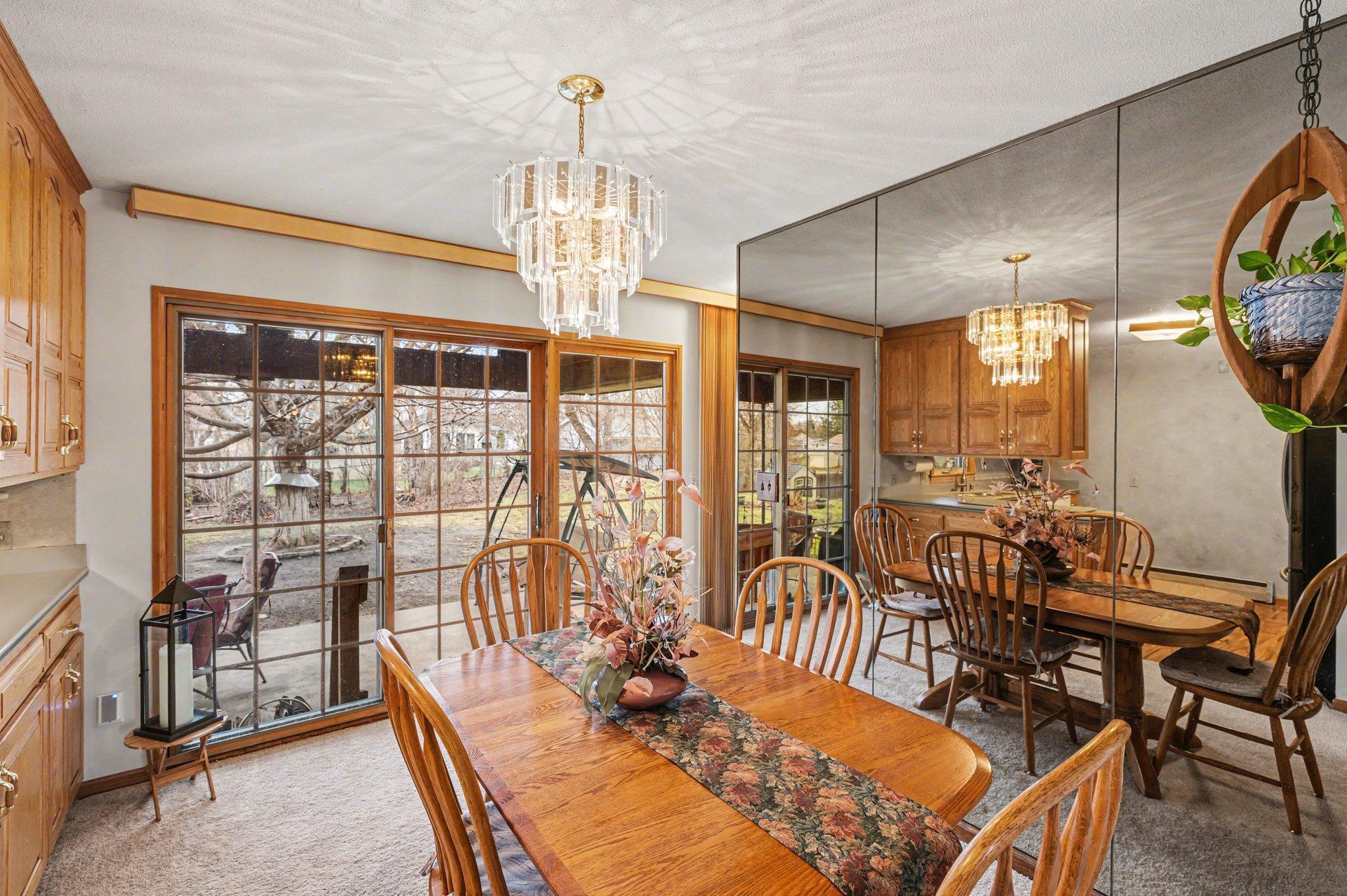 Dining area leads to the covered patio and backyard