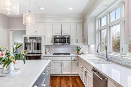 Gas cooktop and double wall ovens offer style and functionality